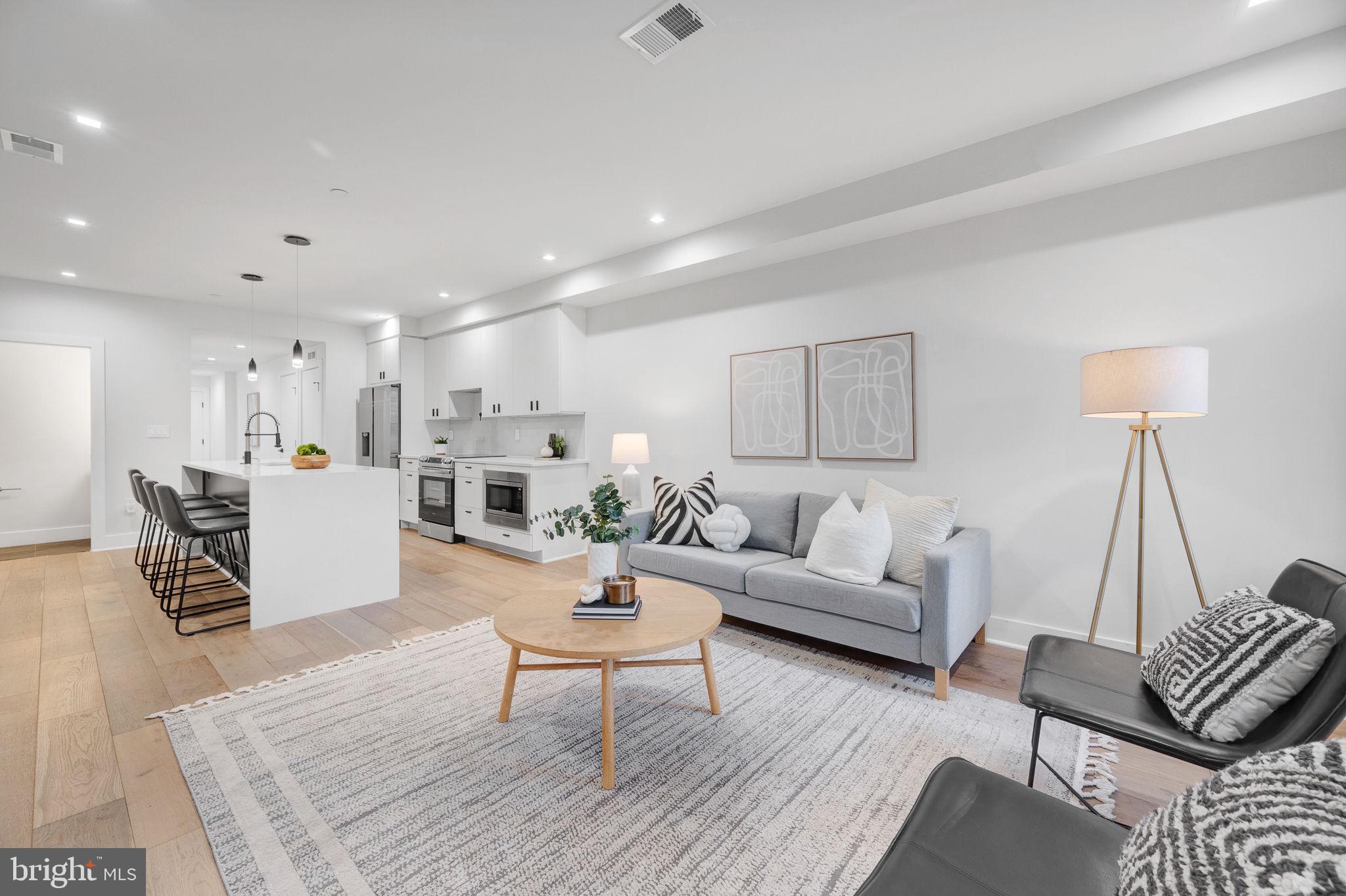 320 Webster Street Northwest, Unit 2 Washington, DC 20011 - Photo 4 of 25 a living room with furniture and a table