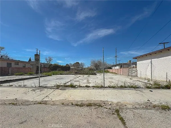 a view of a backyard of a house