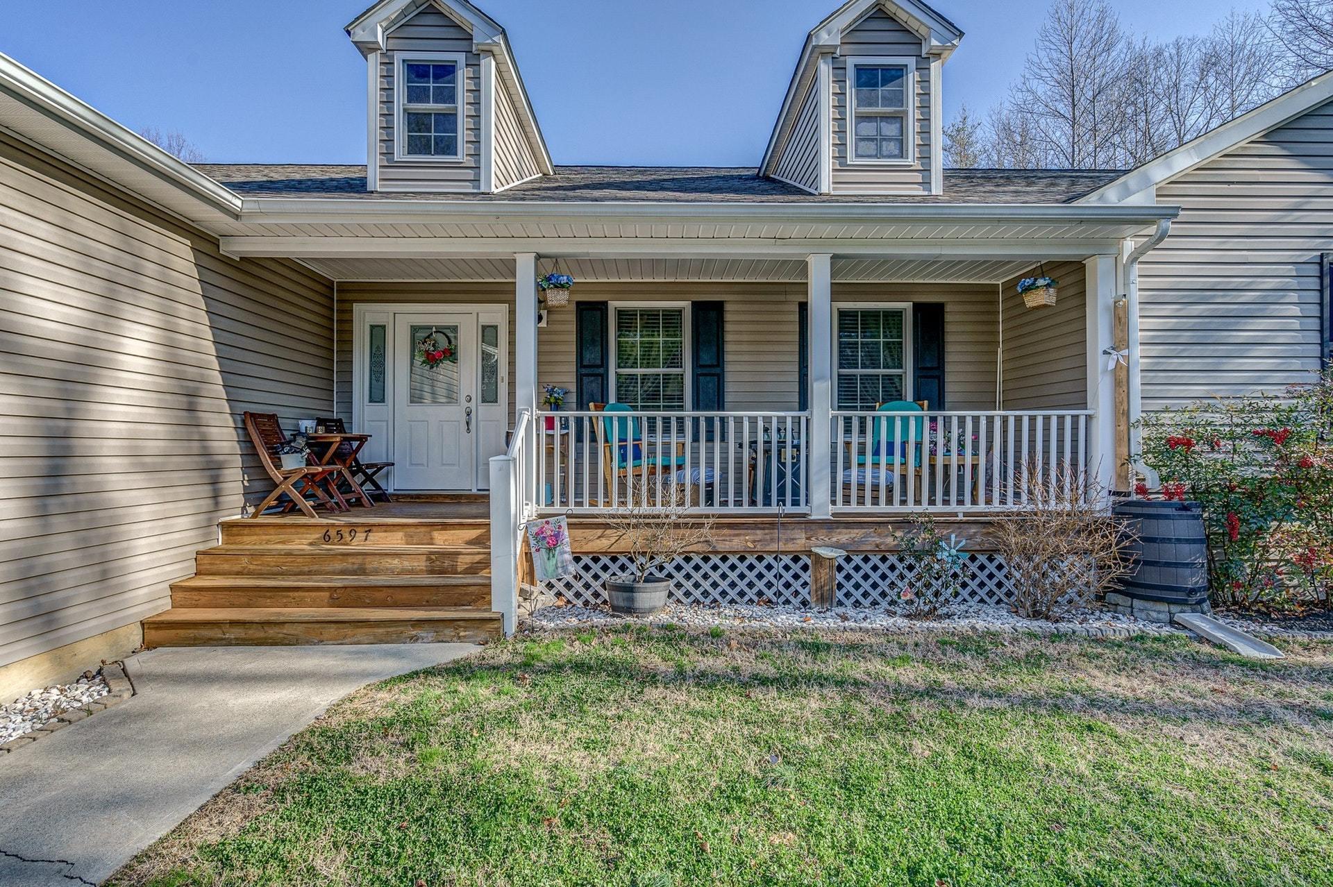 6597 Back Creek Road Boones Mill, VA 24065 - Photo 4 of 27 Rocking chair covered front porch