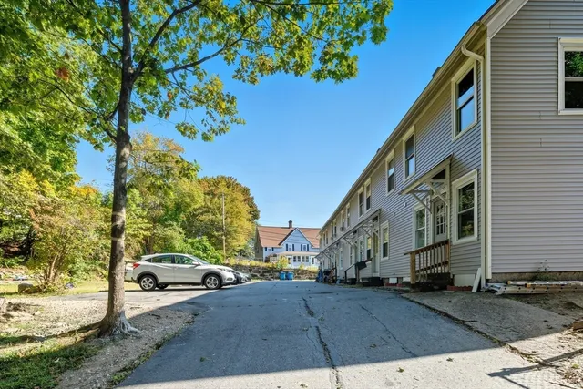 a view of a street with cars