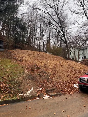 a view of road with trees