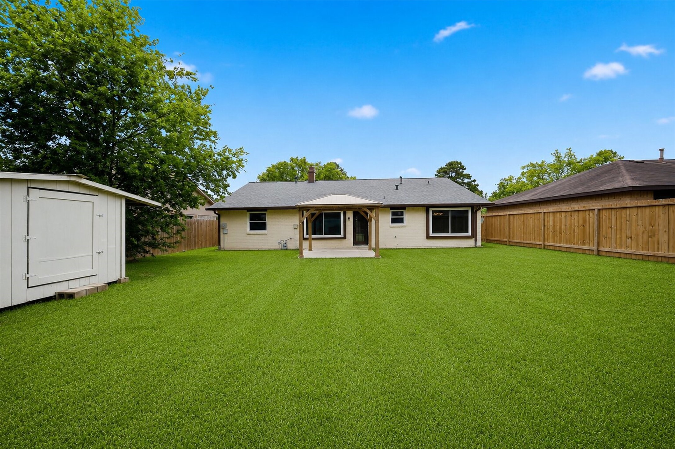 9418 Kilrenny Drive Spring, TX 77379 - Photo 45 of 47 a front view of a house with a garden