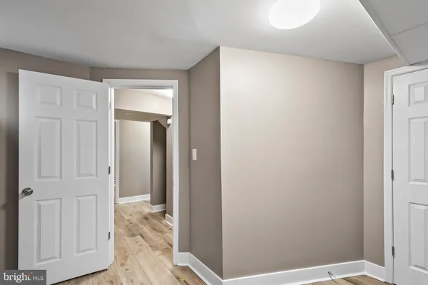 a view of entryway with bathroom