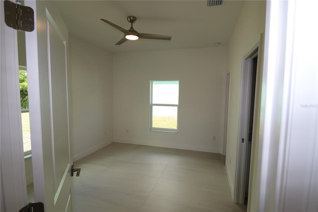 305 Lomond Drive Port Charlotte, FL 33953 - Photo 4 of 12 a view of a livingroom with a window