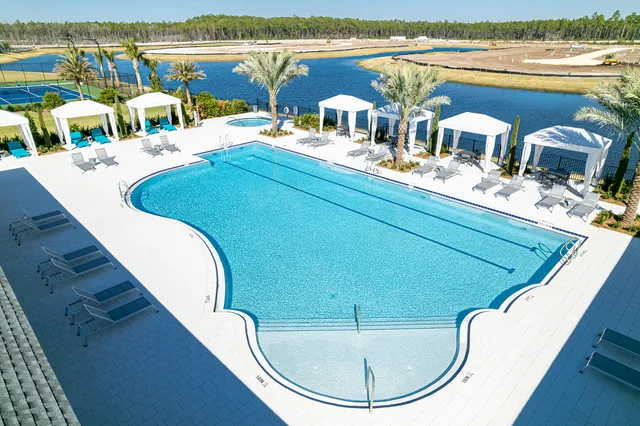 a terrace with outdoor seating and city view