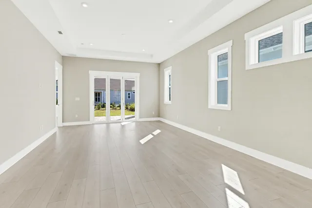 a view of an empty room with a window