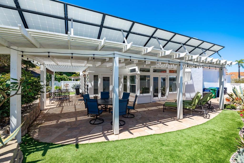 4939 Tilos Way Oceanside, CA 92056 - Photo 28 of 49 a view of a backyard with sitting area and furniture