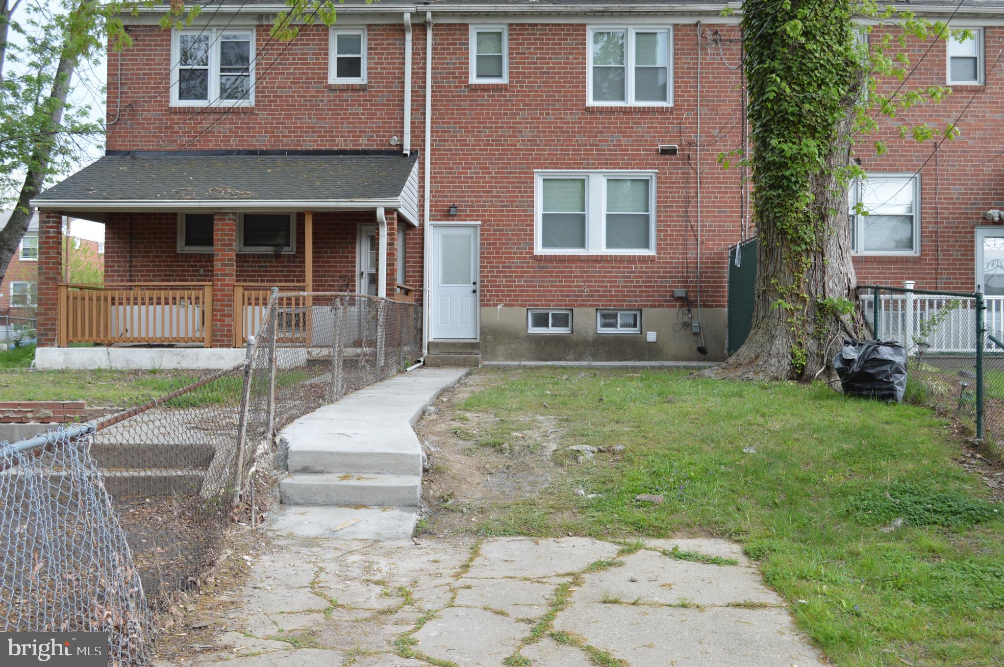 1632 Riverwood Road Baltimore, MD 21221 - Photo 31 of 32 a front view of a house with a yard