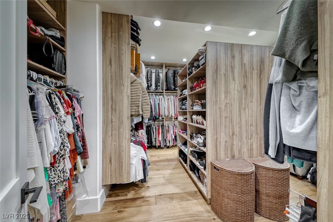 2309 Prometheus Court Henderson, NV 89074 - Photo 35 of 70 Walk in closet with light wood-type flooring