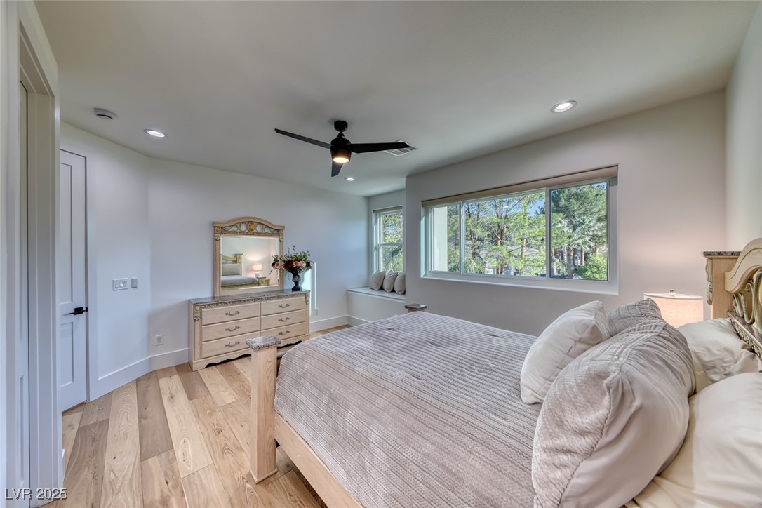 2309 Prometheus Court Henderson, NV 89074 - Photo 45 of 70 Bedroom with light wood-type flooring, recessed lighting, and ceiling fan
