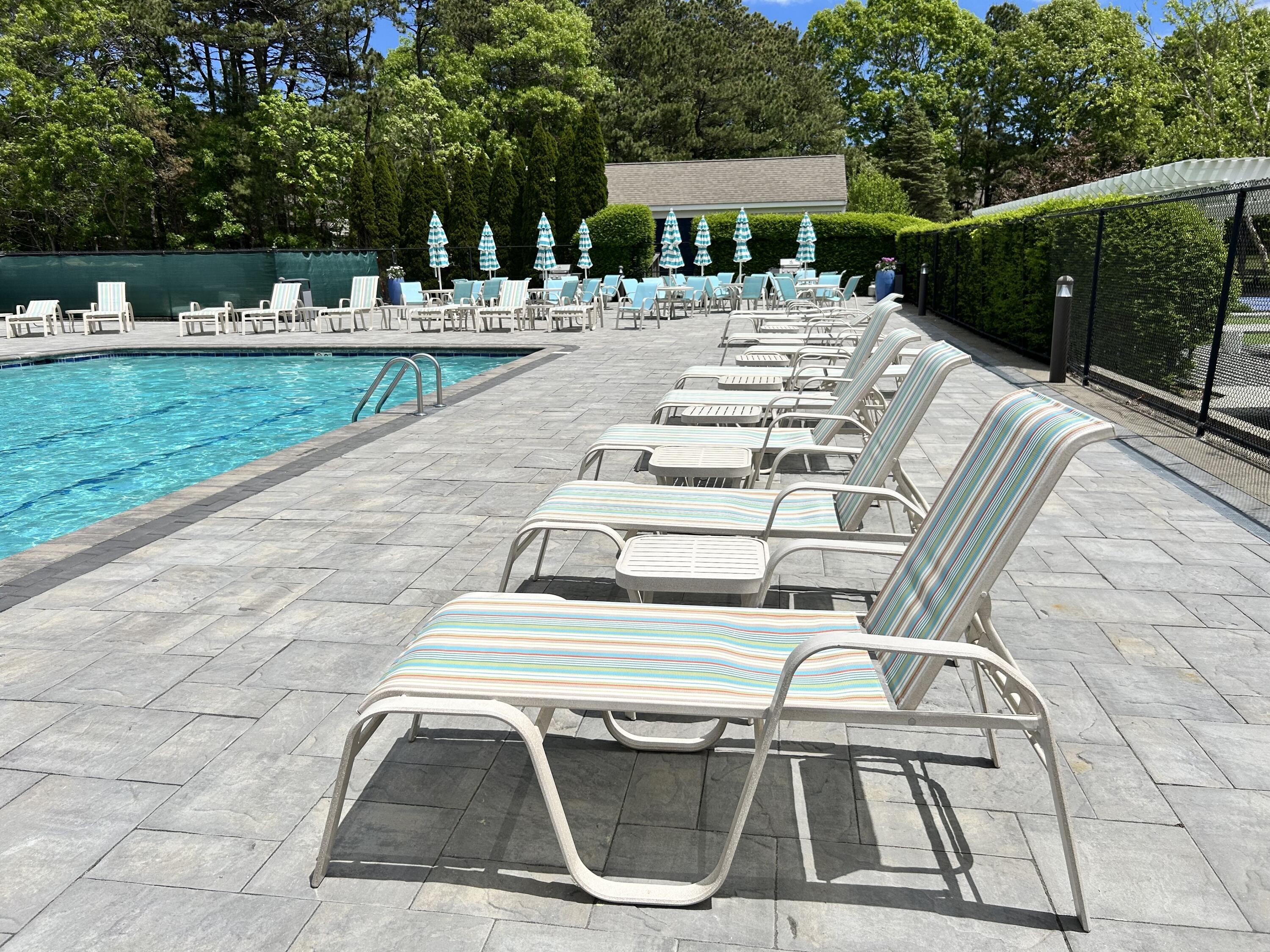 28 Windward Street, Unit 28 Mashpee, MA 02649 - Photo 26 of 37 a view of outdoor space yard and swimming pool