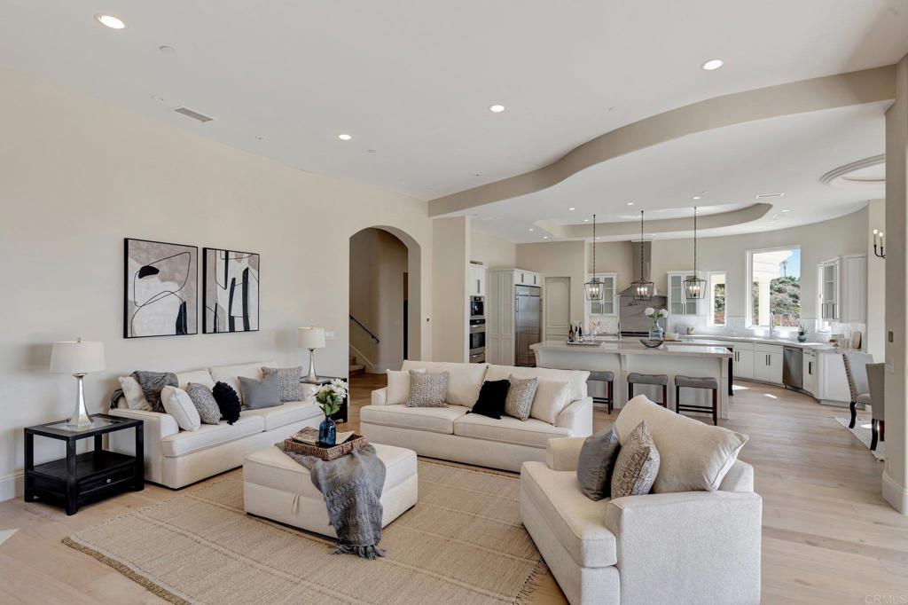 8025 La Milla Rancho Santa Fe, CA 92067 - Photo 17 of 51 a living room with furniture white walls and white walls
