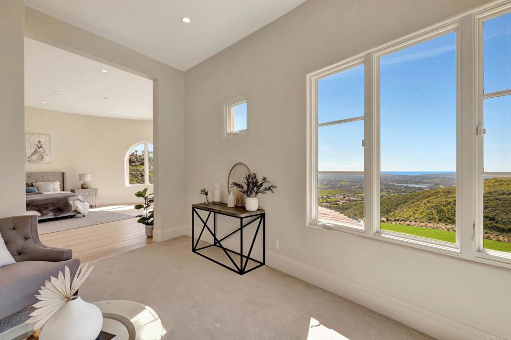 8025 La Milla Rancho Santa Fe, CA 92067 - Photo 26 of 51 a living room with furniture and a large window