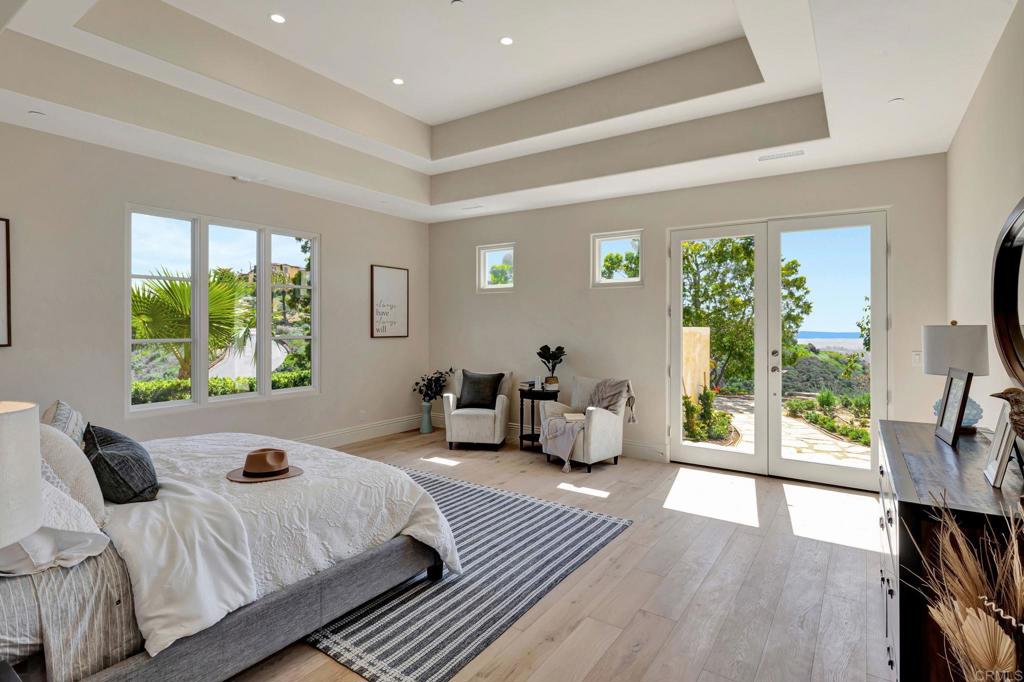 8025 La Milla Rancho Santa Fe, CA 92067 - Photo 30 of 51 a bedroom with furniture and a large window