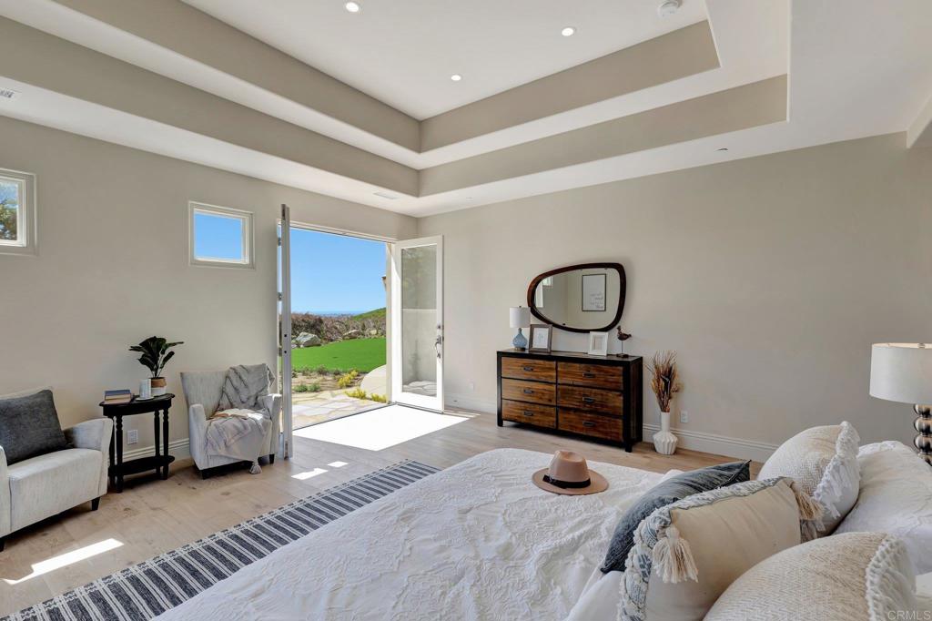 8025 La Milla Rancho Santa Fe, CA 92067 - Photo 32 of 51 a bedroom with bed and a window