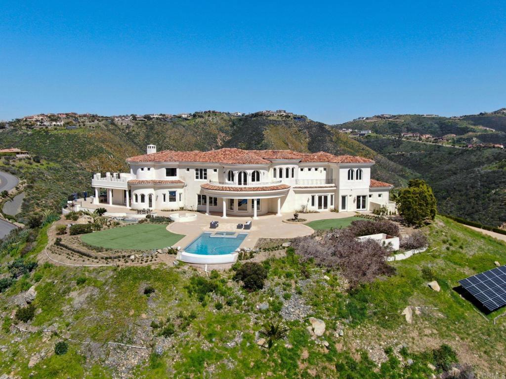 8025 La Milla Rancho Santa Fe, CA 92067 - Photo 40 of 51 an aerial view of residential houses with outdoor space and trees