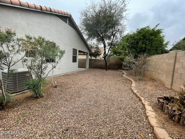 a house with a tree in the background