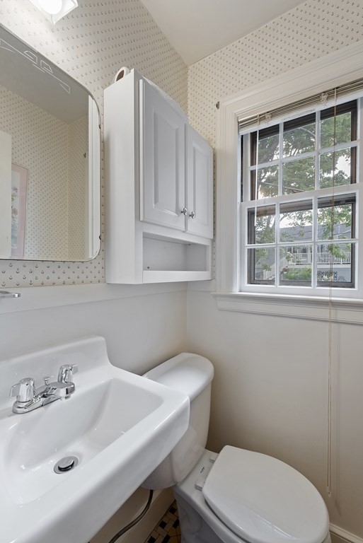 41 Sevinor Road Marblehead, MA 01945 - Photo 13 of 30 a bathroom with a sink a toilet and a mirror