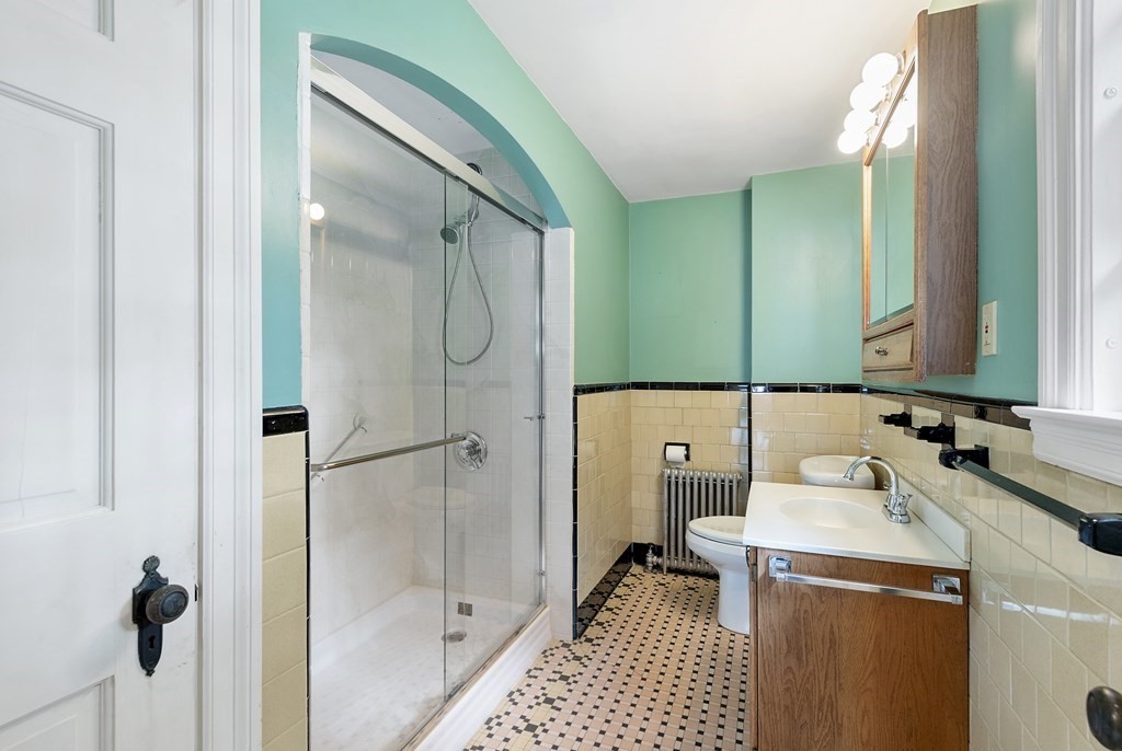 41 Sevinor Road Marblehead, MA 01945 - Photo 18 of 30 a bathroom with a sink a toilet and shower