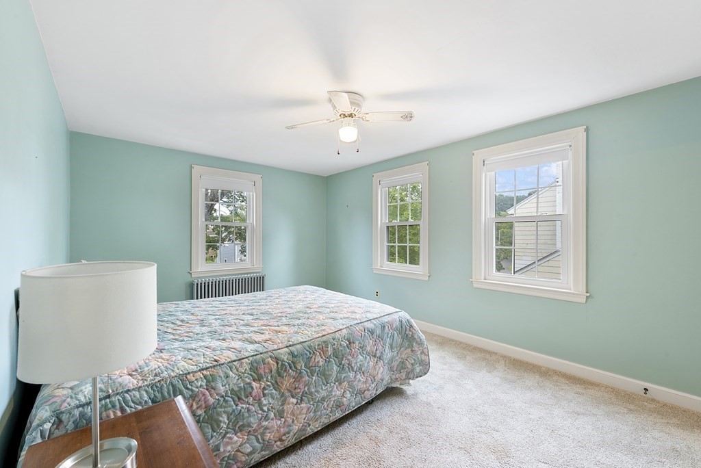 41 Sevinor Road Marblehead, MA 01945 - Photo 19 of 30 a bedroom with a bed dresser and a window