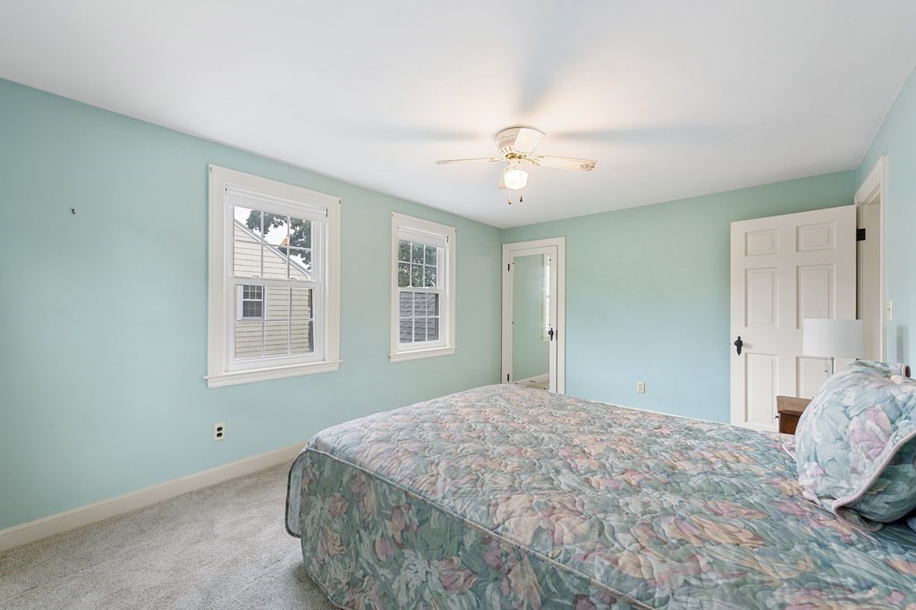 41 Sevinor Road Marblehead, MA 01945 - Photo 20 of 30 a bedroom with a large bed and a window