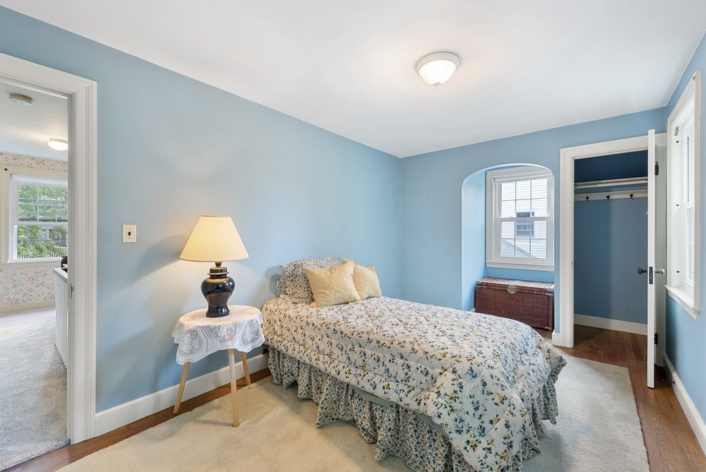 41 Sevinor Road Marblehead, MA 01945 - Photo 21 of 30 a bedroom with a bed and a lamp on dresser