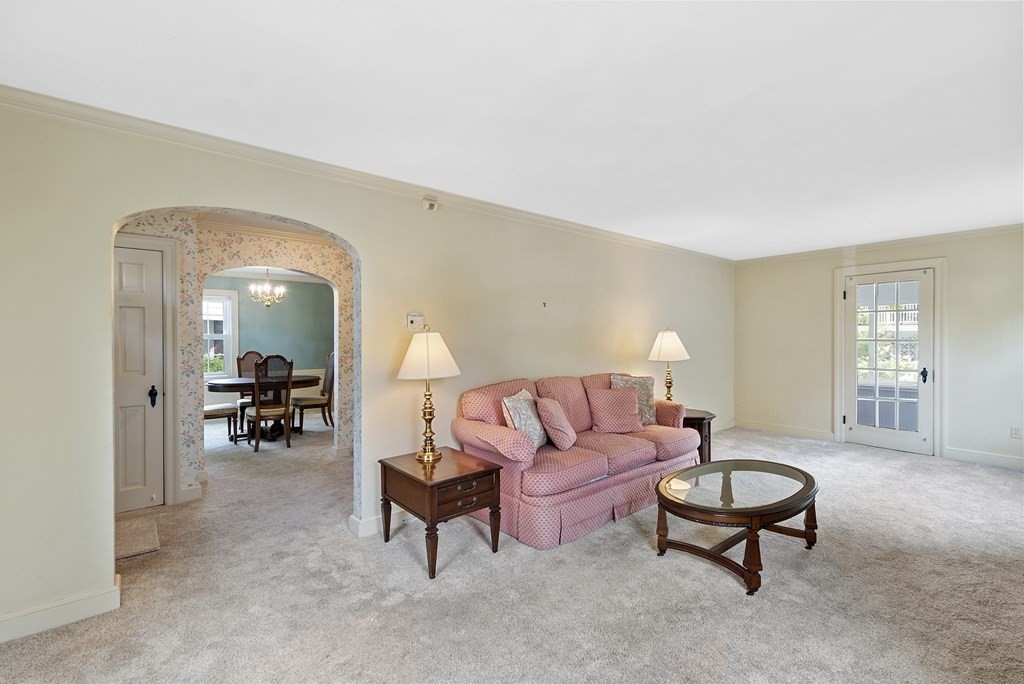 41 Sevinor Road Marblehead, MA 01945 - Photo 4 of 30 a living room with furniture and a dining table with kitchen view