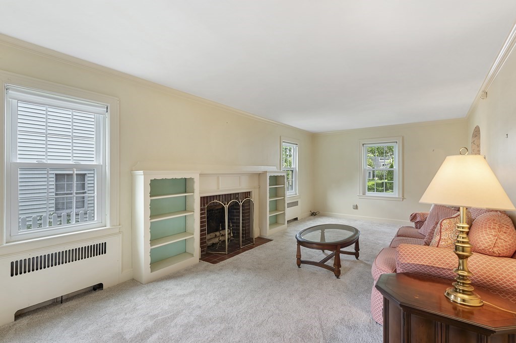 41 Sevinor Road Marblehead, MA 01945 - Photo 5 of 30 a living room with furniture and a fireplace