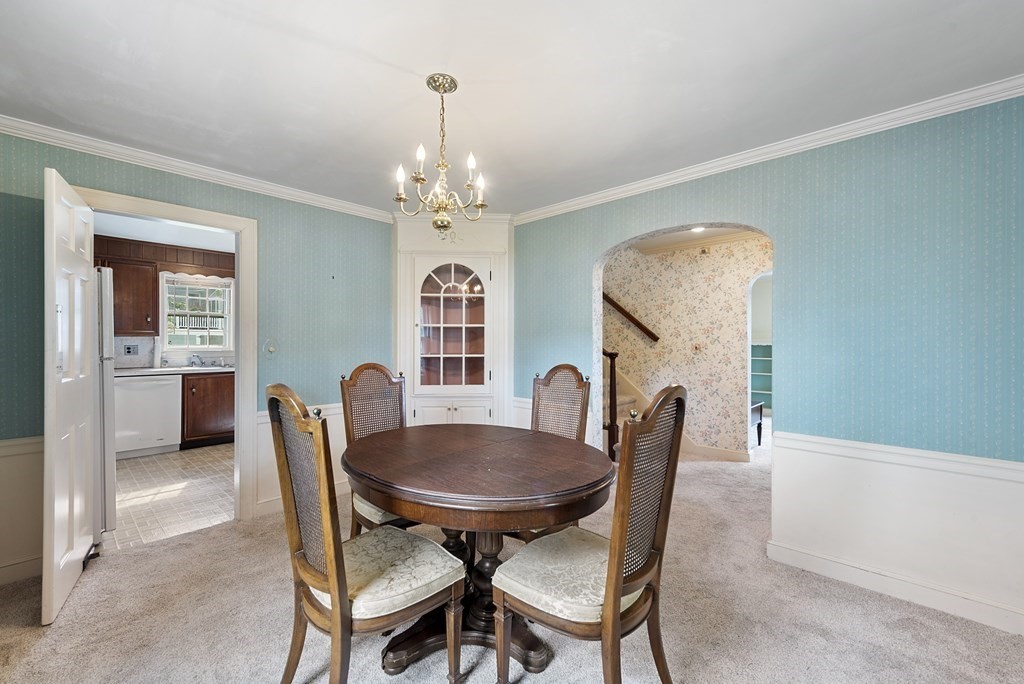41 Sevinor Road Marblehead, MA 01945 - Photo 8 of 30 a view of a dining room with furniture and chandelier