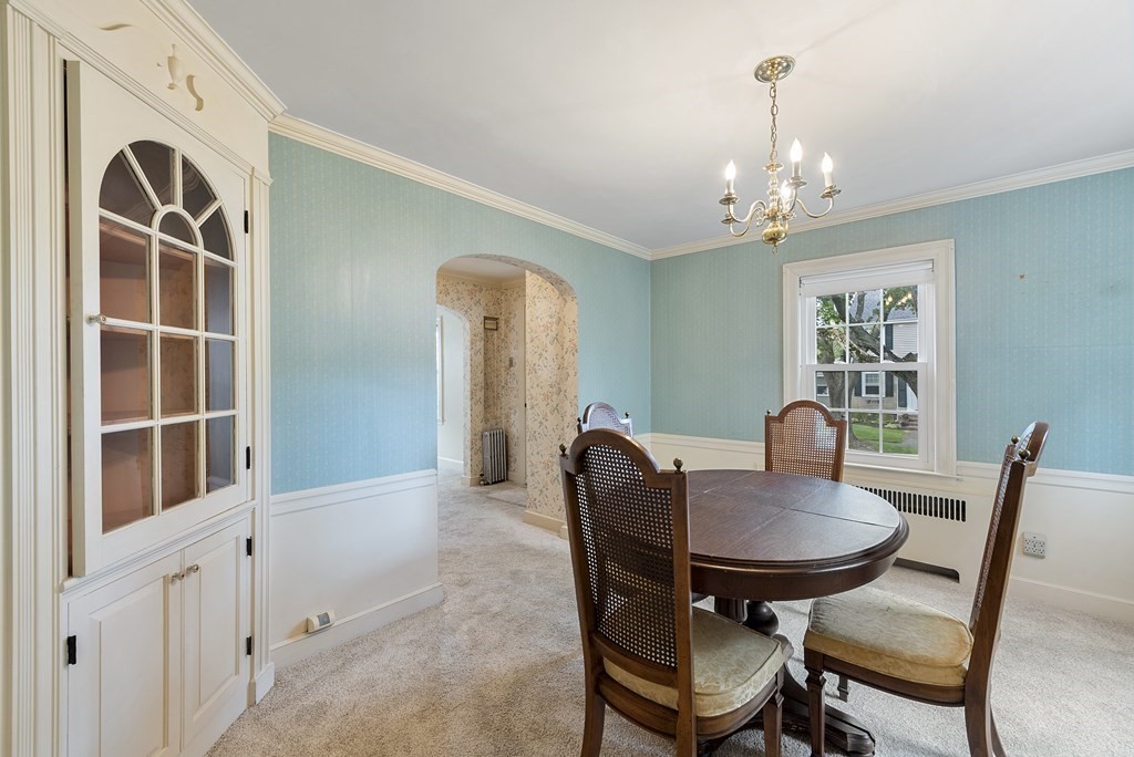 41 Sevinor Road Marblehead, MA 01945 - Photo 9 of 30 a view of a dining room with furniture and chandelier