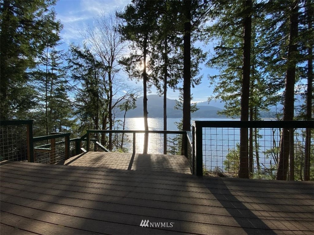 2300 East Quilcene Road Quilcene, WA 98376 - Photo 6 of 9 a view of deck with patio and wooden floor