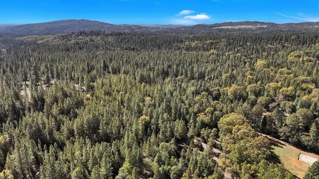 a view of a city with mountains in the background
