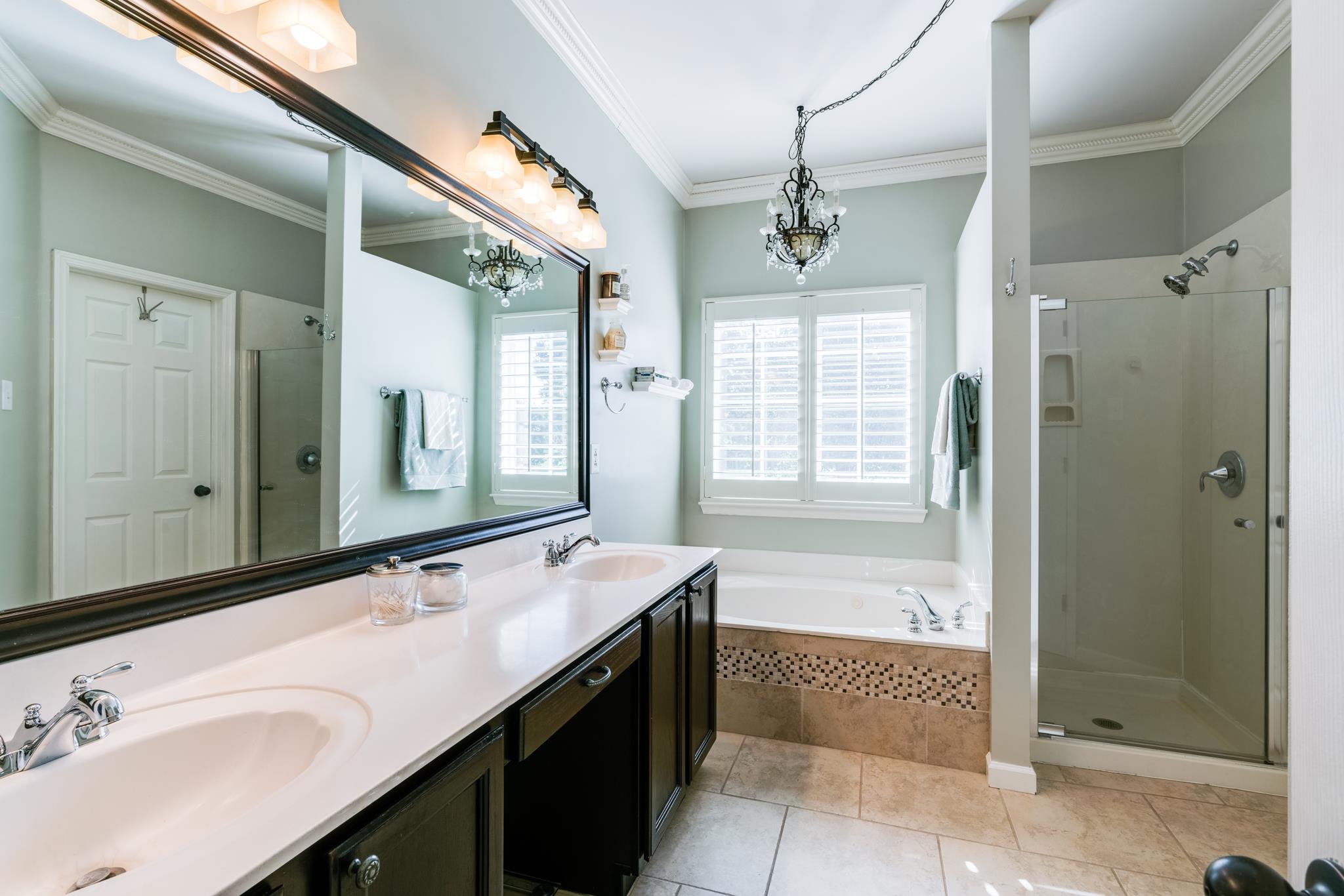 3126 Vera Valley Road Franklin, TN 37064 - Photo 18 of 30 a bathroom with a double vanity sink mirror and shower