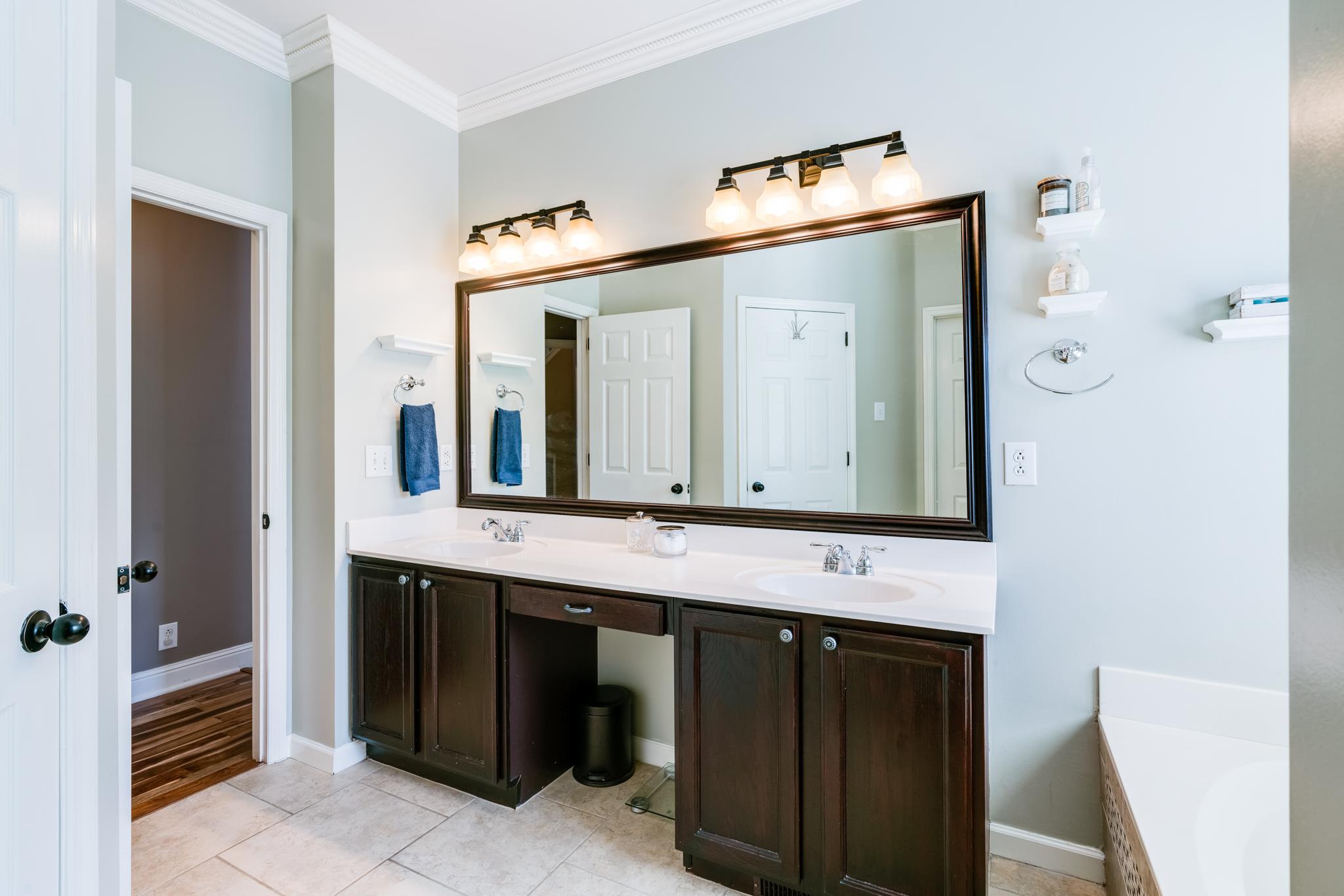3126 Vera Valley Road Franklin, TN 37064 - Photo 19 of 30 a bathroom with a sink and a mirror