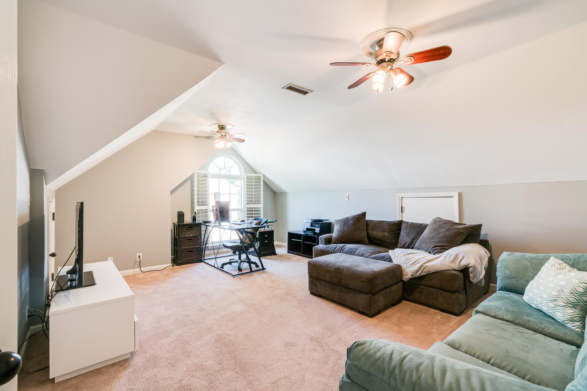 3126 Vera Valley Road Franklin, TN 37064 - Photo 24 of 30 a living room with furniture a chandelier fan and a window