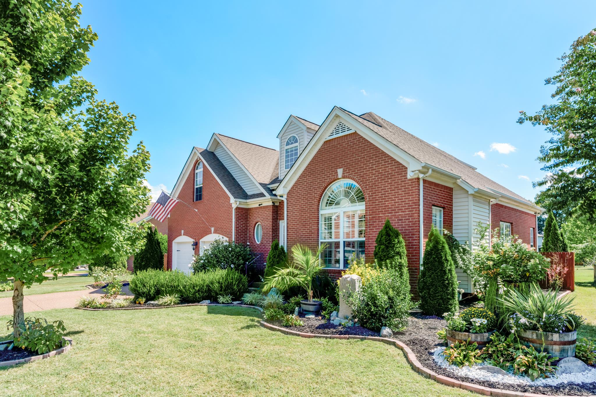3126 Vera Valley Road Franklin, TN 37064 - Photo 4 of 30 a front view of a house with a yard