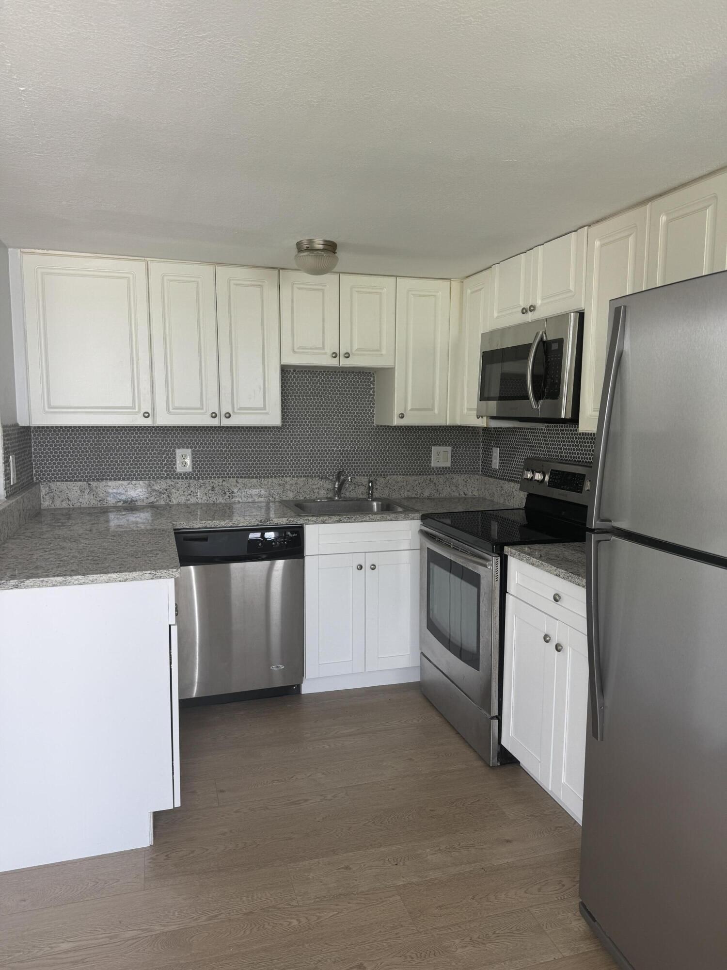 1501 Crescent Circle, Unit E45 Lake Park, FL 33403 - Photo 2 of 21 IMG_0979