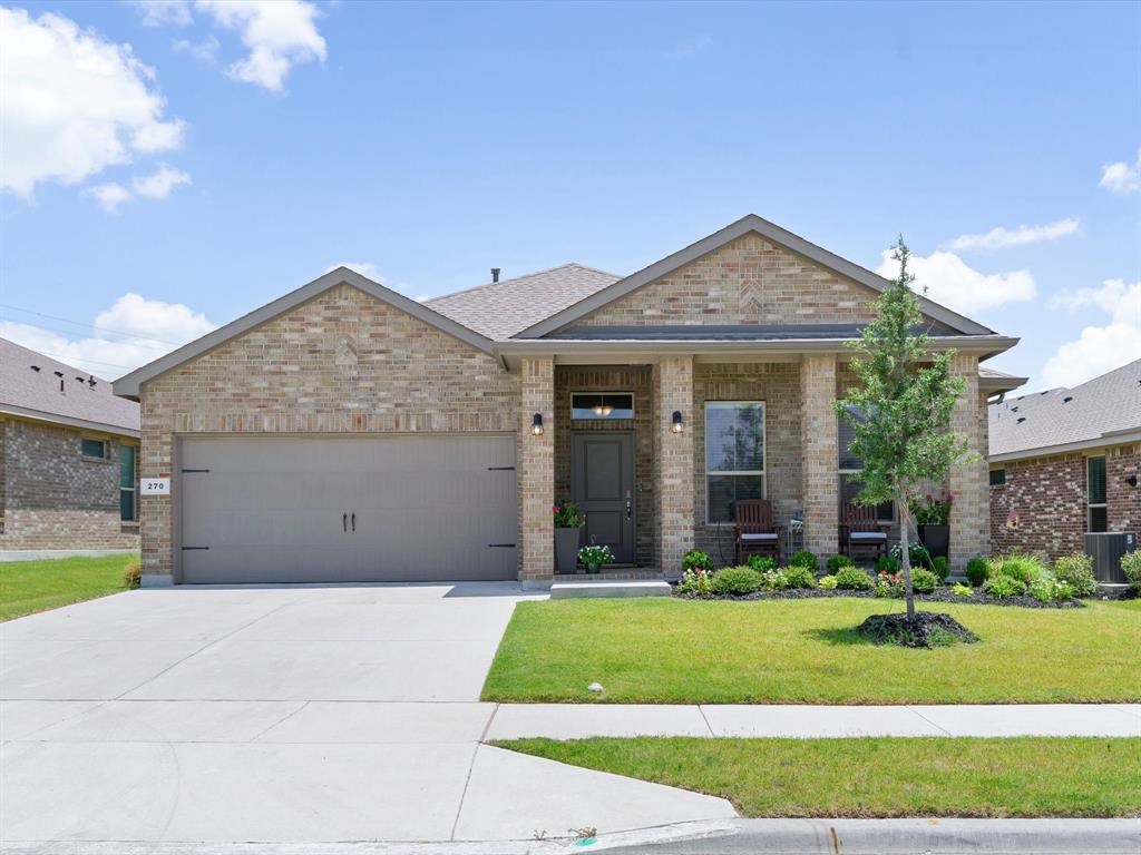 Welcome to 270 Lunayena Rd. in Rhome, Texas. This inviting front elevation showcases the home's curb appeal, spacious homesite, and peaceful setting, offering the ideal blend of country living with convenient access to major highways, shopping, dining, and the greater DFW area.