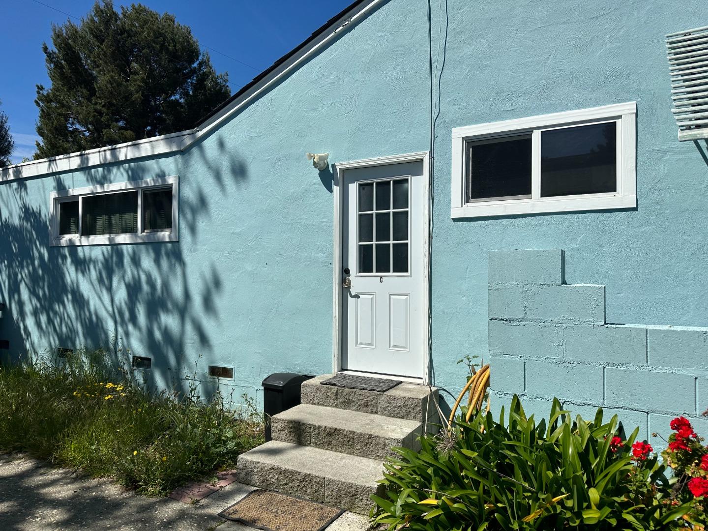 2986 Moorpark Avenue San Jose, CA 95128 - Photo 6 of 8 a front view of a house with a yard