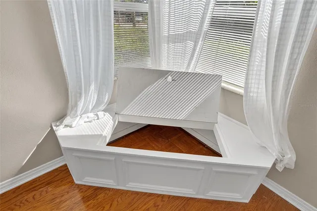 a view of walk in closet with empty racks