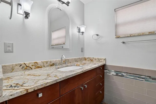 a bathroom with a shower and a toilet