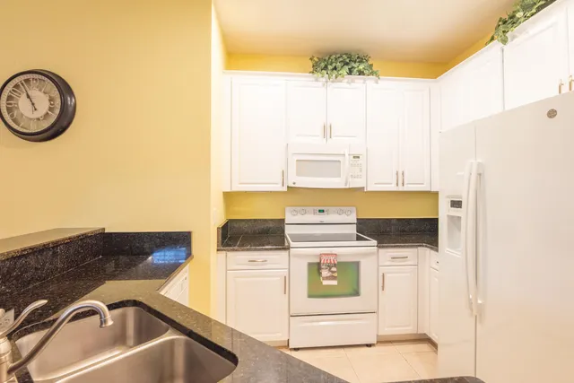 a bathroom with a sink and a stove