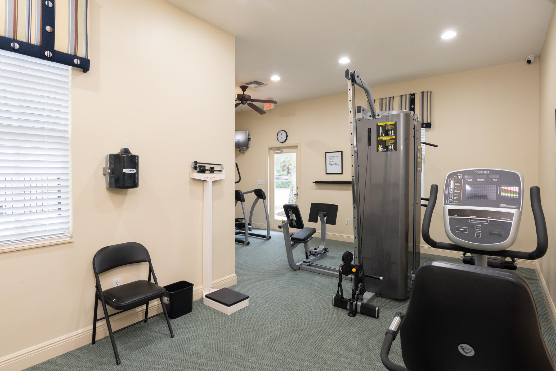 1600 Southeast Sheffield Terrace, Unit 201 Stuart, FL 34994 - Photo 27 of 28 a view of a workspace with furniture and a window