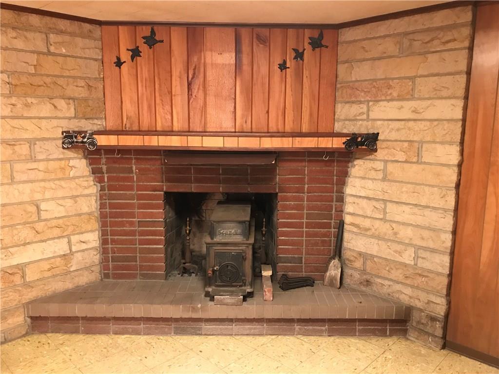 10120 Rinaman Road Wexford, PA 15090 - Photo 19 of 25 Wood burner in gameroom