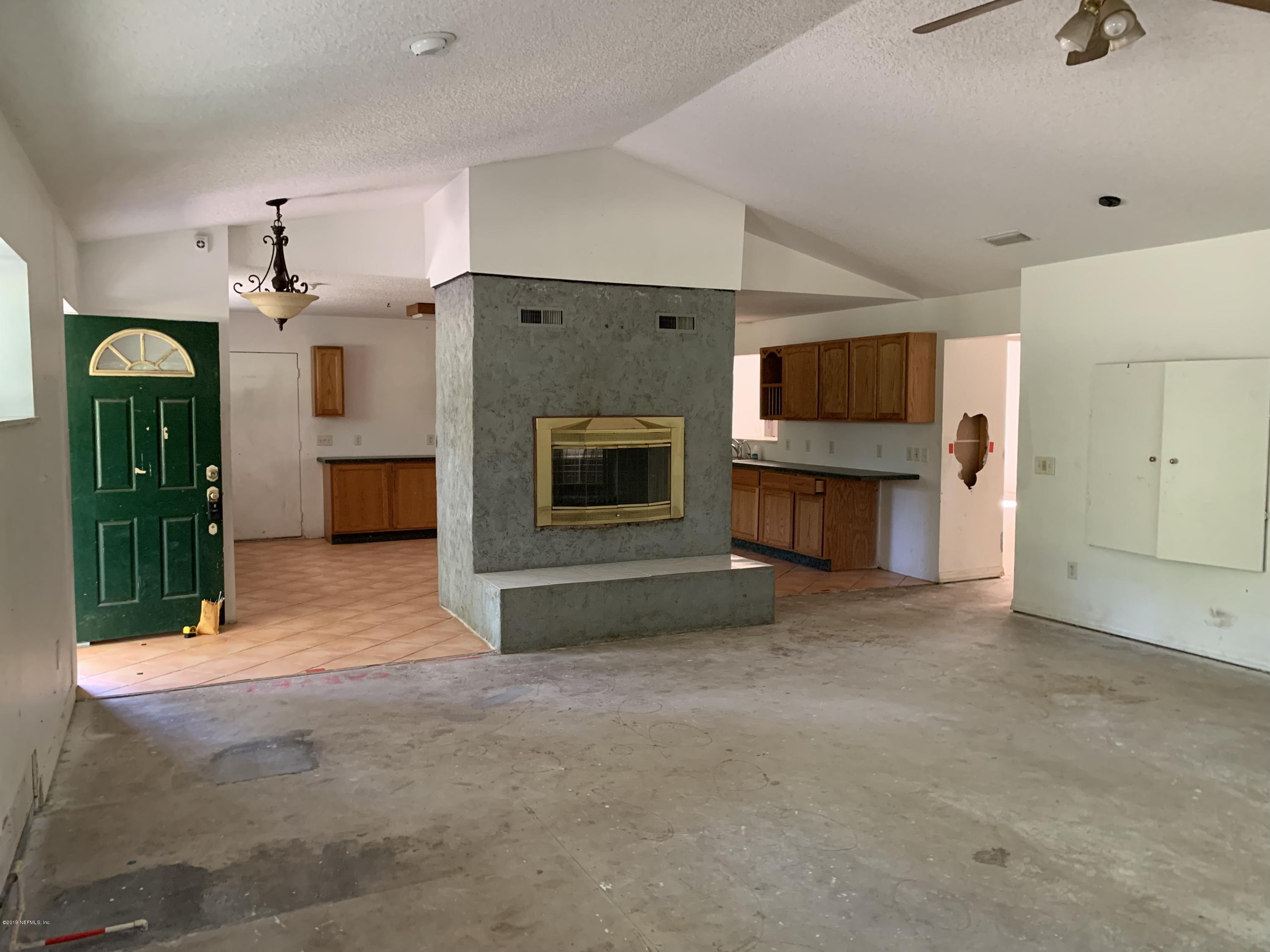 44387 Swallowfork Avenue Callahan, FL 32011 - Photo 8 of 22 16. LIVING ROOM VIEW 2