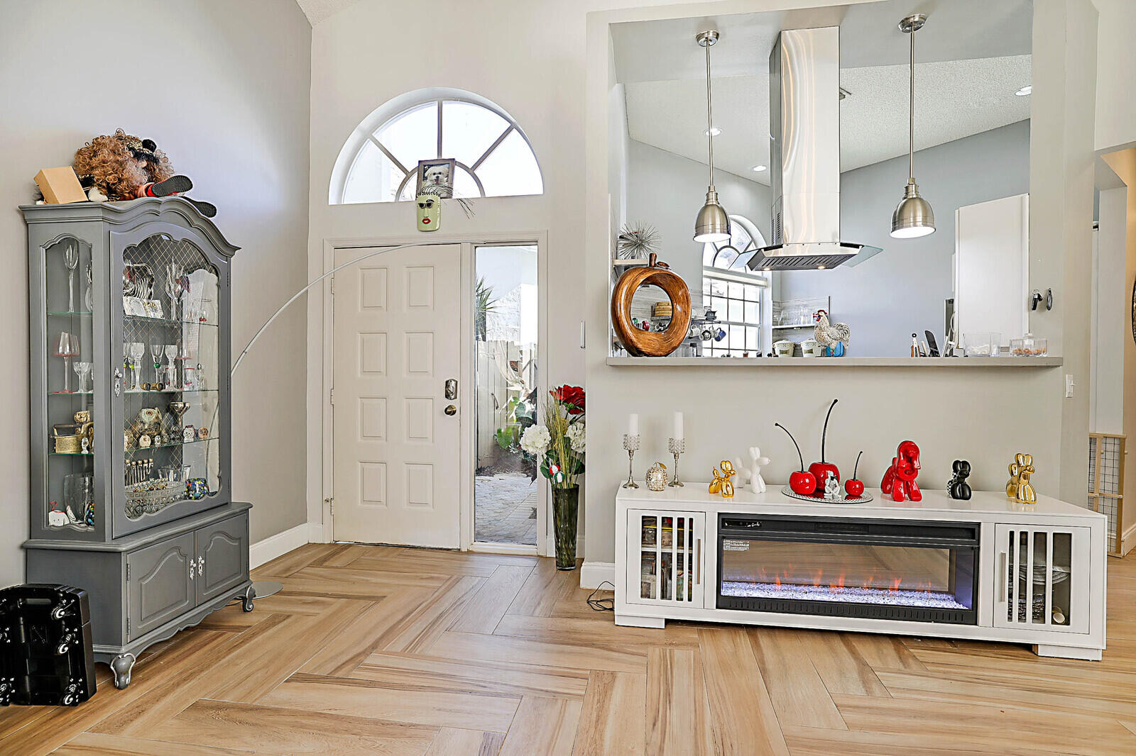 6655 Northwest 25th Avenue Boca Raton, FL 33496 - Photo 11 of 33 a bedroom with a bed and cabinets