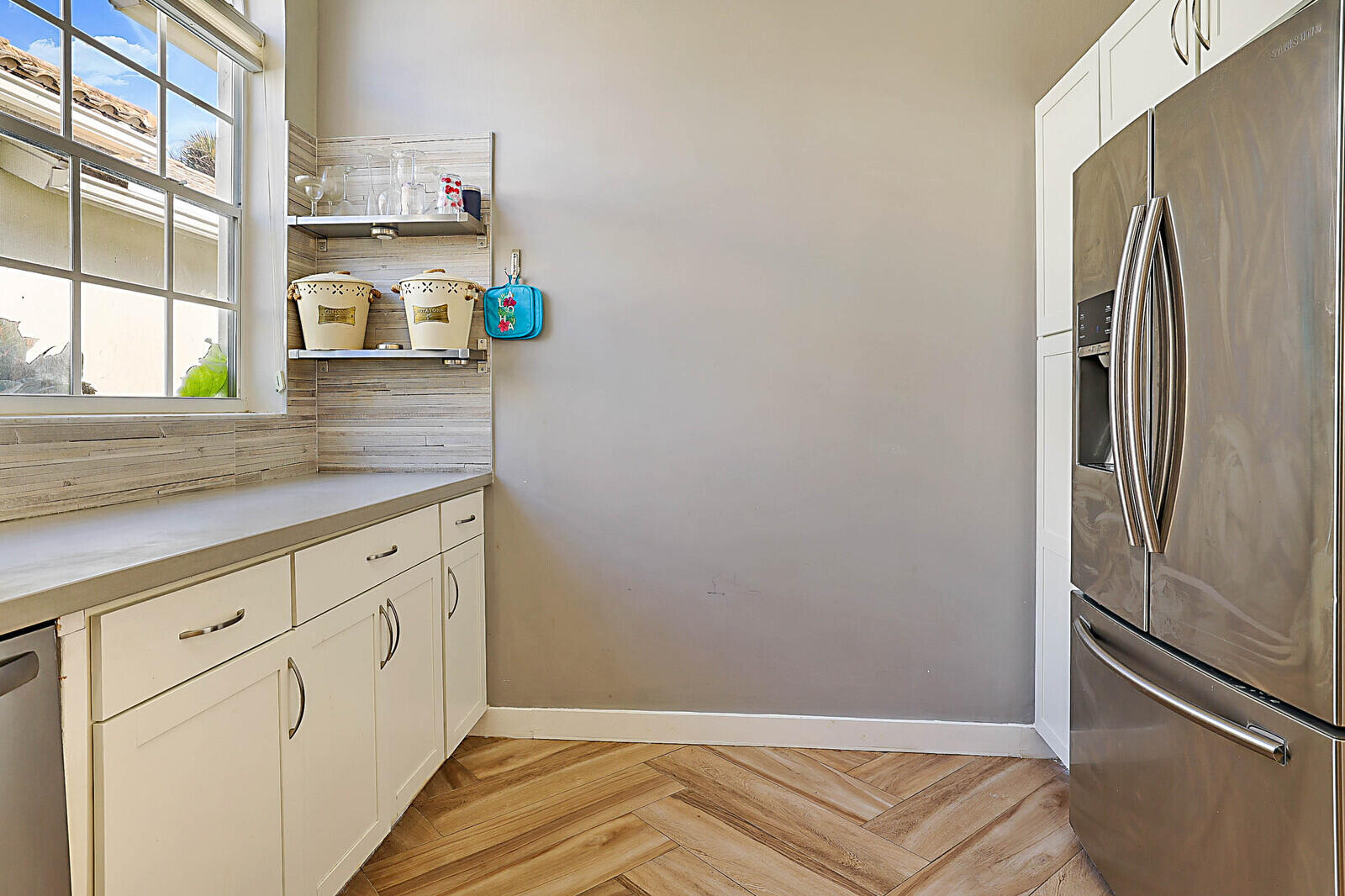 6655 Northwest 25th Avenue Boca Raton, FL 33496 - Photo 16 of 33 a view of a kitchen from a window