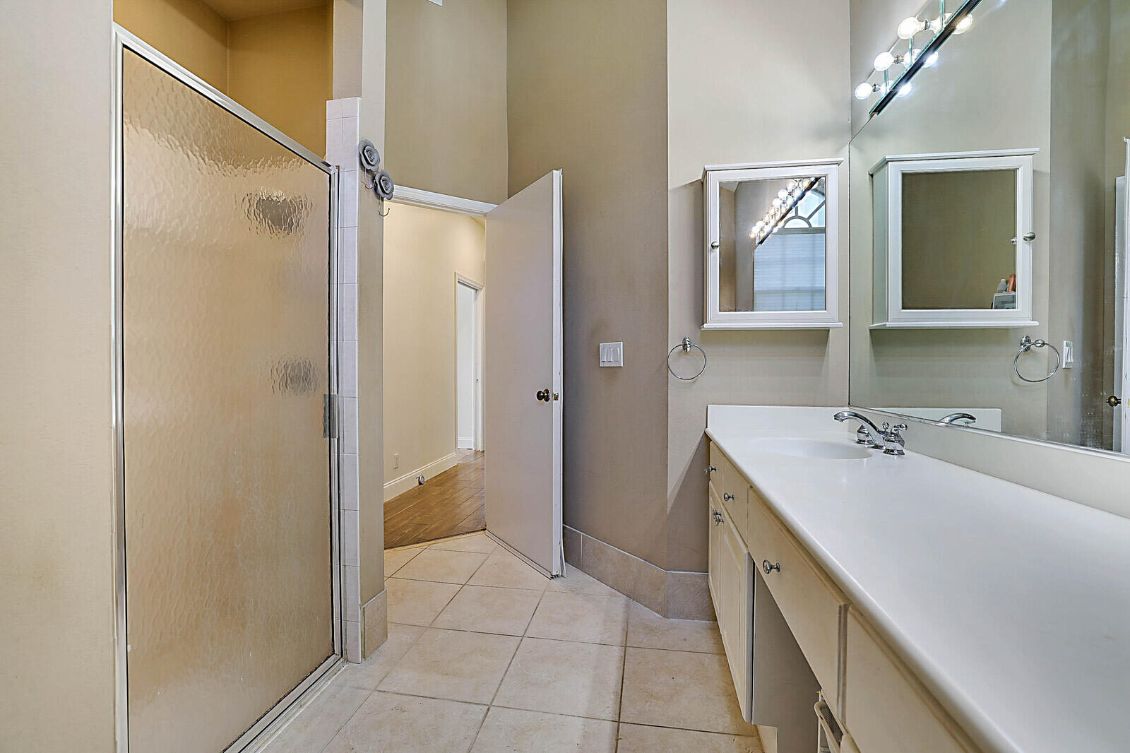 6655 Northwest 25th Avenue Boca Raton, FL 33496 - Photo 21 of 33 a bathroom with a sink and mirror