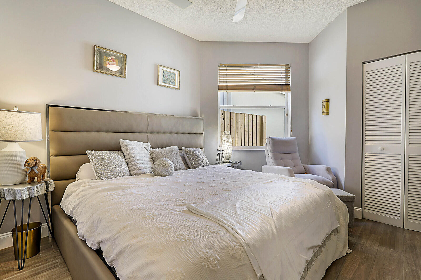6655 Northwest 25th Avenue Boca Raton, FL 33496 - Photo 22 of 33 a bedroom with a bed and a window