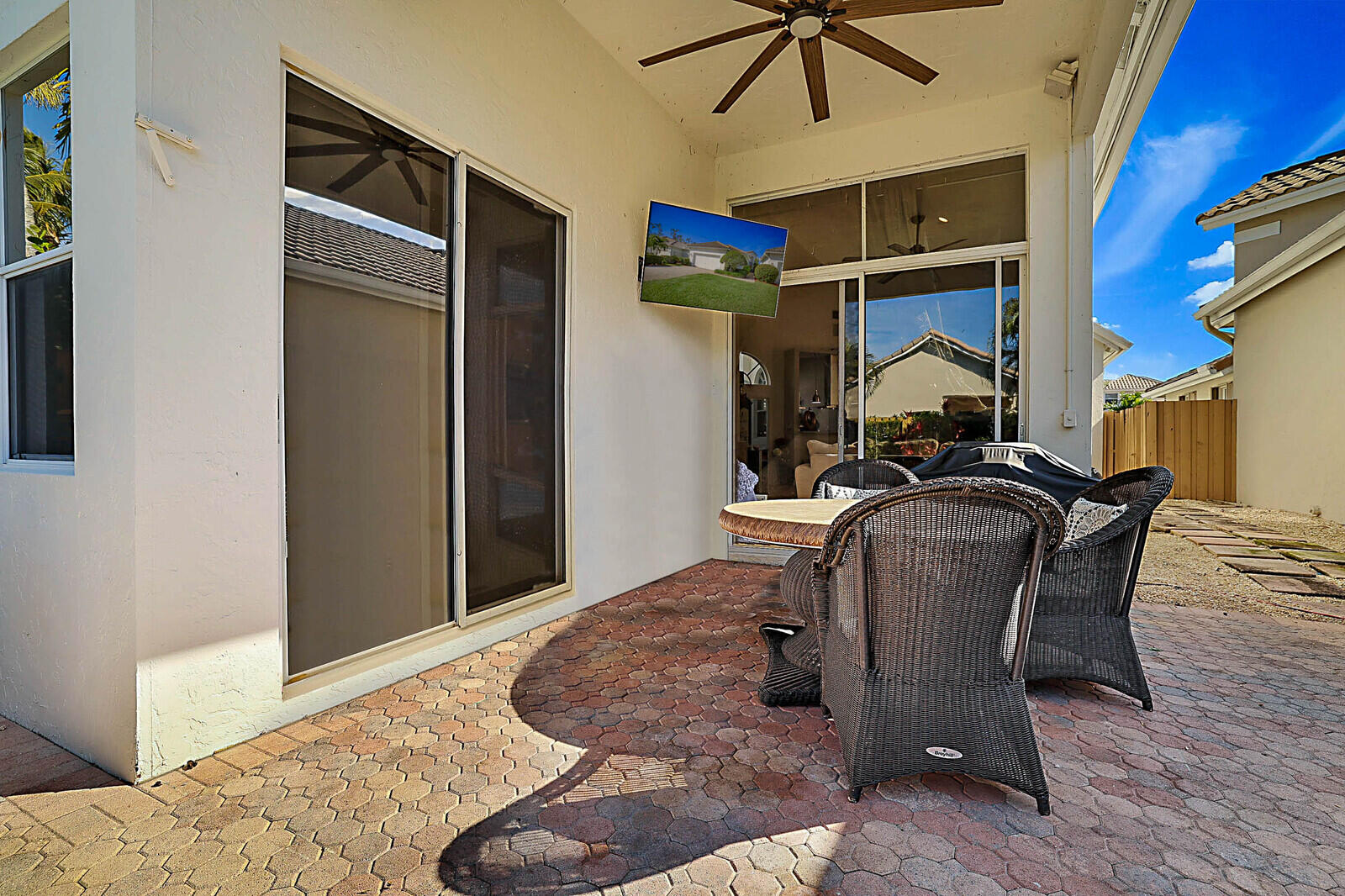6655 Northwest 25th Avenue Boca Raton, FL 33496 - Photo 27 of 33 a bedroom with a bed and a ceiling fan